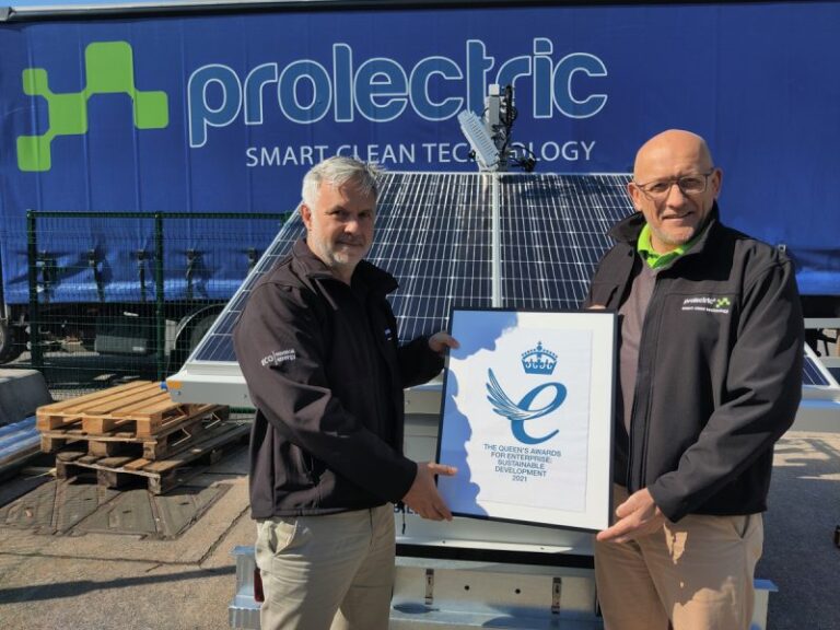 Chris Williams and Greg Poulter with Queens 2021 award